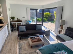 Fabulous new build garden studio with own patio